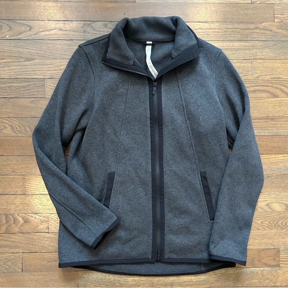Lululemon grey zip up jacket size 8 with black zipper and pocket detail